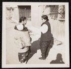 Two village ladies conversing